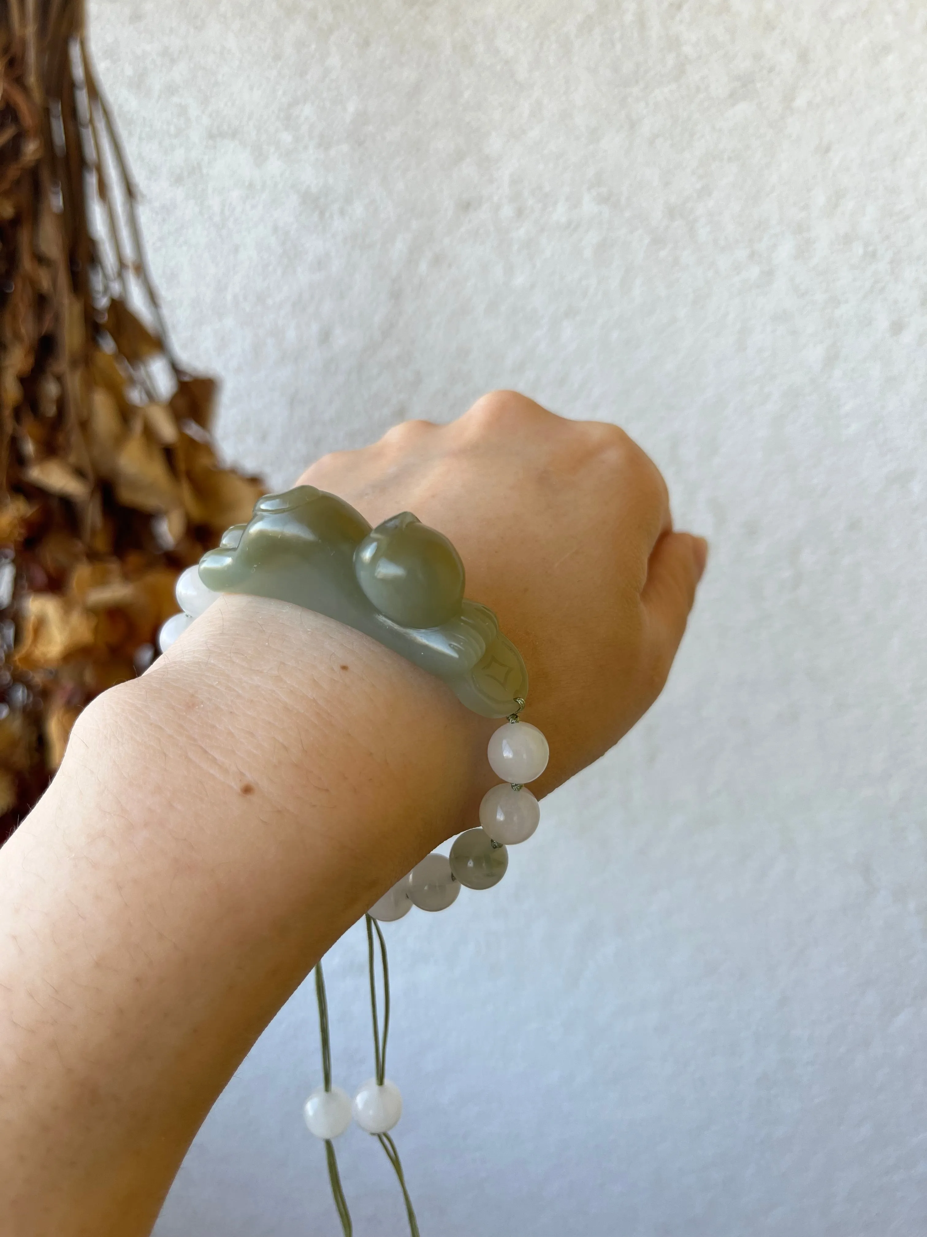 Handwoven Bracelet with a Hand Carved Nephrite Jade Lucky Cat Pendant, 手编和田可爱趴趴招财猫手牌