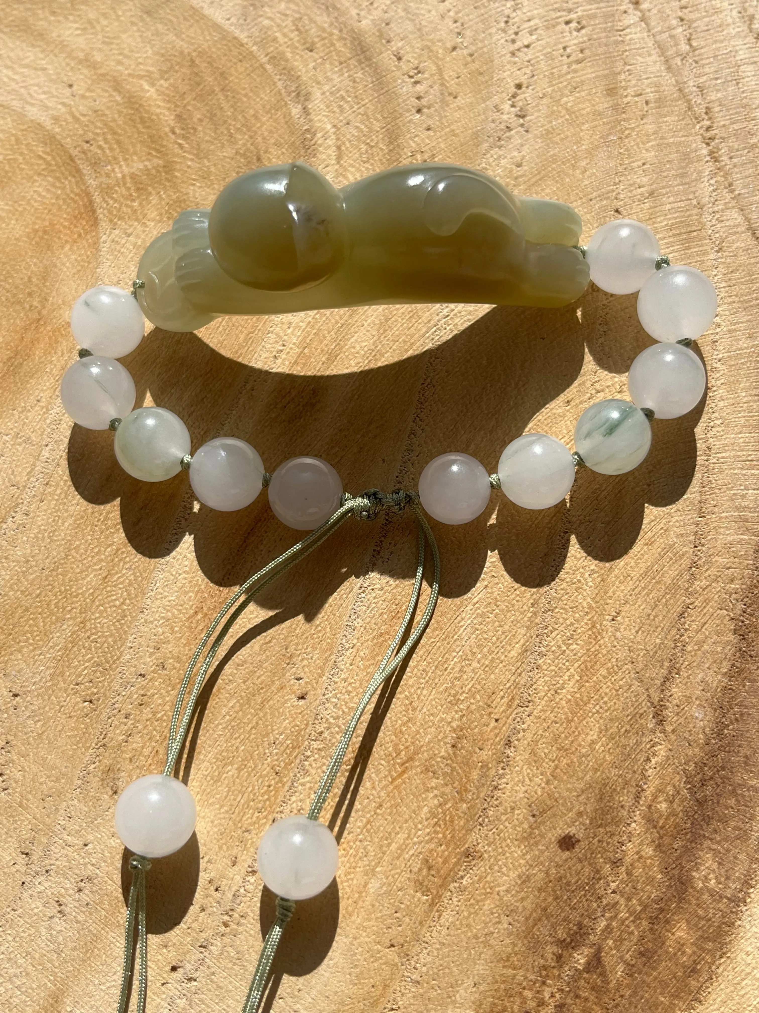 Handwoven Bracelet with a Hand Carved Nephrite Jade Lucky Cat Pendant, 手编和田可爱趴趴招财猫手牌