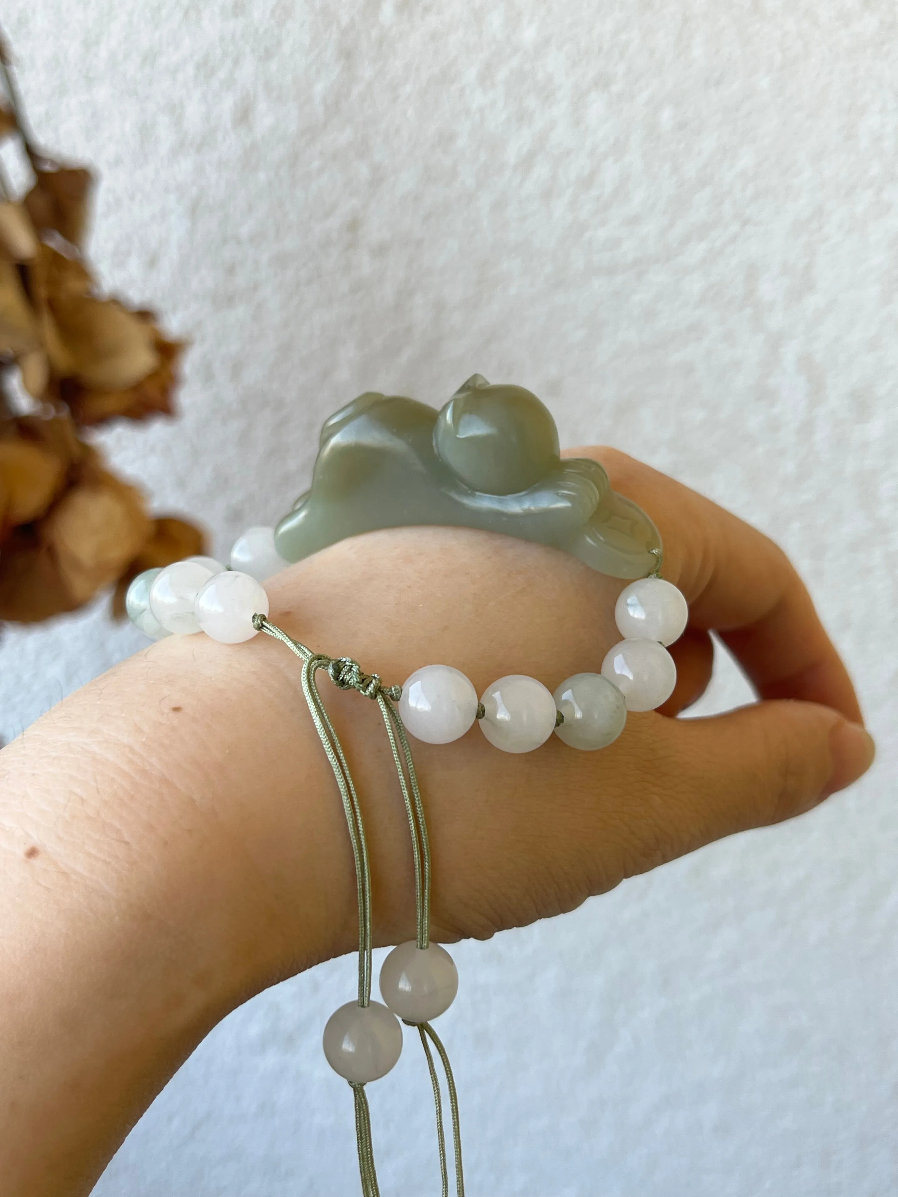 Handwoven Bracelet with a Hand Carved Nephrite Jade Lucky Cat Pendant, 手编和田可爱趴趴招财猫手牌